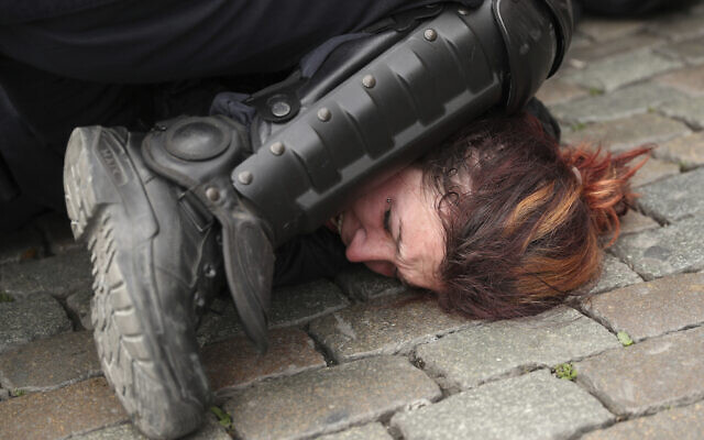 Police detain a woman during a yellow vest protest with other groups in Brussels, May 26, 2019. (AP Photo/Francisco Seco, File) Police detain a woman during a yellow vest protest with other groups in Brussels, May 26, 2019. (AP Photo/Francisco Seco, File)