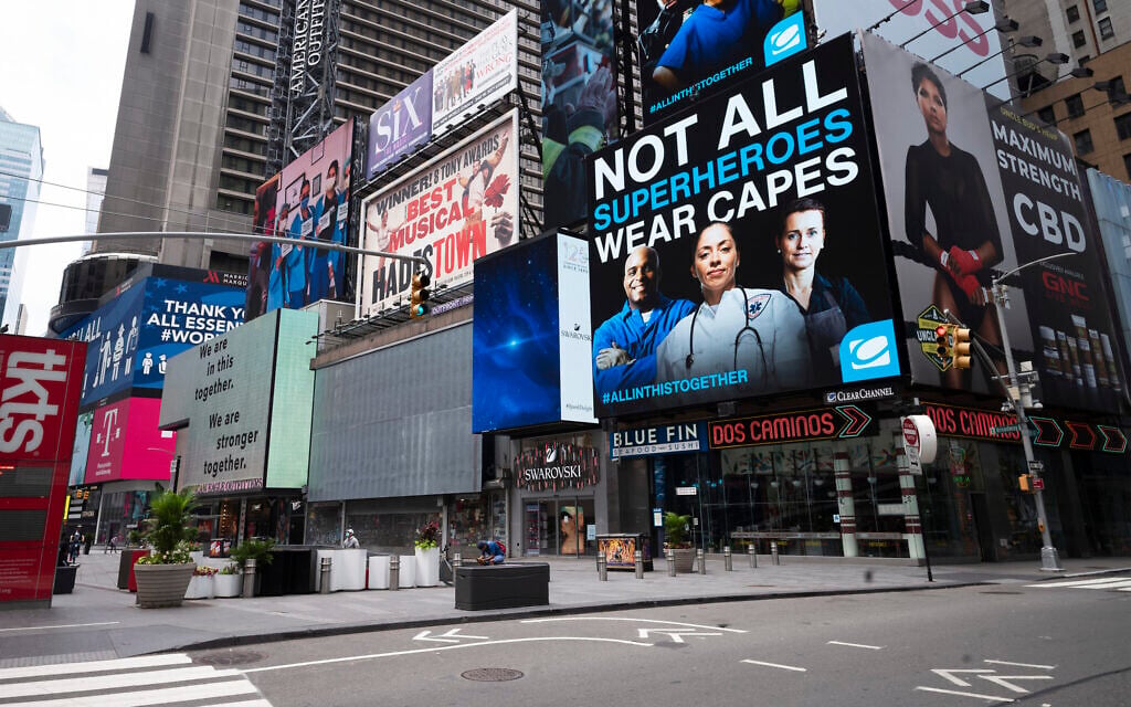 New York's Times Square is quiet on  Friday, May 29, 2020. (AP Photo/Mark Lennihan)