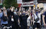 Protesters march during a solidarity rally for George Floyd, June 4, 2020, in the Brooklyn borough of New York. Floyd died after being restrained by Minneapolis police officers on May 25. (AP Photo/Frank Franklin II)