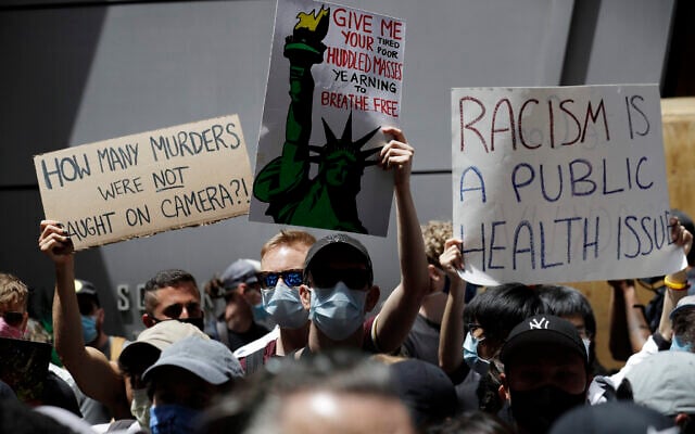 Protesters rally near the edge of Times Square in New York, June 7, 2020. (Seth Wenig/AP)