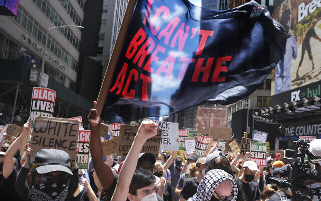 Protesters rally near the edge of Times Square in New York, June 7, 2020. (AP Photo/Seth Wenig) Protesters rally near the edge of Times Square in New York, June 7, 2020. (AP Photo/Seth Wenig)