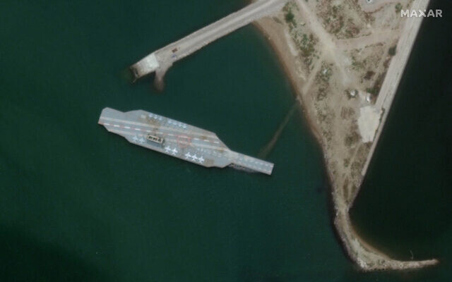 A fake aircraft carrier is seen off the coast of Bandar Abbas, Iran, June 7, 2020. (Satellite image ©2020 Maxar Technologies via AP)