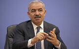 Palestinian Authority Prime Minister Mohammad Shtayyeh speaks during a press conference at the Foreign Press Association in the West Bank city of Ramallah, on June 9, 2020. (Abbas Momani/Pool Photo via AP)