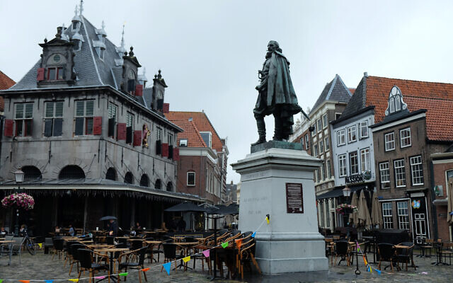 A statue of the Dutch Golden Age trader and brutal colonialist Jan Pieterszoon Coen stands tall above a square in his hometown of Hoorn, north of Amsterdam, Netherlands on June 11, 2020. (AP Photo/Michael Corder) A statue of the Dutch Golden Age trader and brutal colonialist Jan Pieterszoon Coen stands tall above a square in his hometown of Hoorn, north of Amsterdam, Netherlands on June 11, 2020. (AP Photo/Michael Corder)