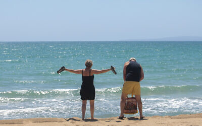 German tourists arrive at the beach of Palma de Mallorca, Spain, June 15, 2020. (Joan Mateu/AP)