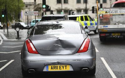 Damage to Britain's Prime Minister Boris Johnson's car after a man ran in front of it as it left the Houses of Parliament, in London, June 17, 2020. (Victoria Jones/PA via AP)