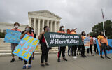 Illustrative: DACA students celebrate in front of the US Supreme Court in in Washington,DC, on June 18, 2020. (AP Photo/Manuel Balce Ceneta)