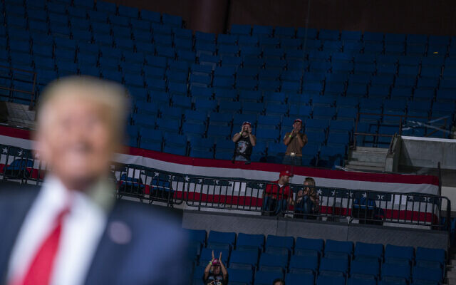 US President Donald Trump supporters cheer as Trump speaks during a campaign rally at the BOK Center, Saturday, June 20, 2020, in Tulsa, Okla. (AP Photo/Evan Vucci) US President Donald Trump supporters cheer as Trump speaks during a campaign rally at the BOK Center, Saturday, June 20, 2020, in Tulsa, Okla. (AP Photo/Evan Vucci)