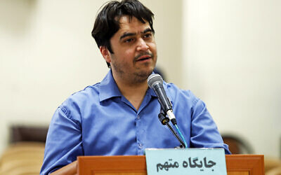 Journalist Ruhollah Zam speaks during his trial at the Revolutionary Court, in Tehran, Iran on June 2, 2020. (Ali Shirband/Mizan News Agency via AP)
