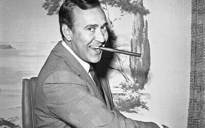 In this May 25, 1967 file writer-comedian Carl Reiner poses in his new hairpiece in Los Angeles. (AP/Harold Filan, File)