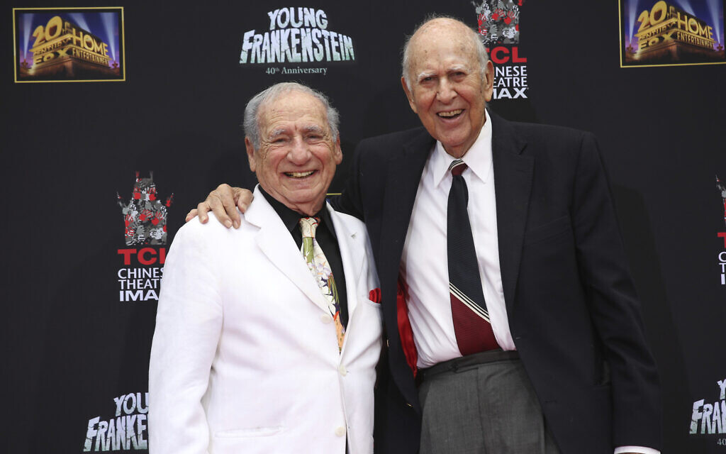 In this September 8, 2014 file photo, Mel Brooks, left, stands with Carl Reiner during Brooks' hand and footprint ceremony on the 40th anniversary of the movie "Young Frankenstein," in Los Angeles. (AP/Nick Ut, File)