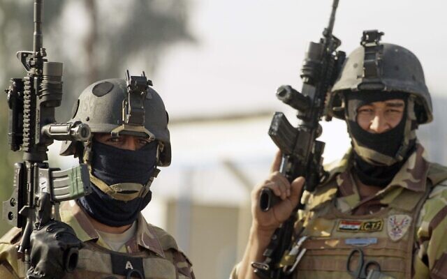 Illustrative: Iraqi special operations forces soldiers are seen at a school visit to distribute school supplies and food in western Baghdad, Iraq, January 17, 2010. (AP Photo/Maya Alleruzzo, File) Illustrative: Iraqi special operations forces soldiers are seen at a school visit to distribute school supplies and food in western Baghdad, Iraq, January 17, 2010. (AP Photo/Maya Alleruzzo, File)