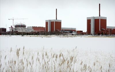 The nuclear power plant Olkiluoto 3 'OL3' under construction next to OL2 and OL1 nuclear reactors in Eurajoki, southwestern Finland, March 23, 2011. (AP Photo/Lehtikuva, Antti Aimo-Koivisto)
