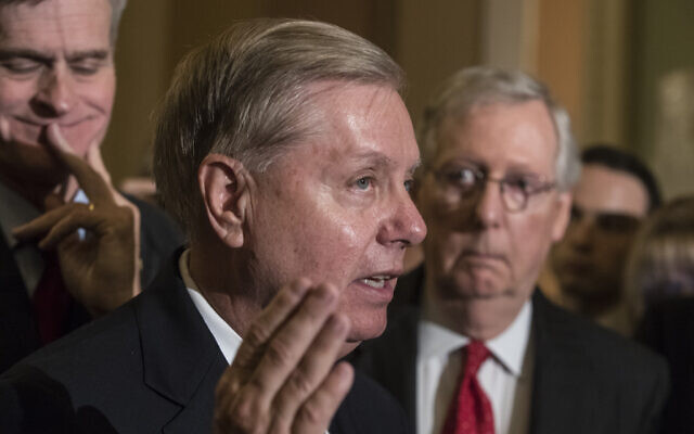 Illustrative: Sen. Lindsay Graham, R-S.C., flanked by Sen. Bill Cassidy, R-La., left, and Senate Majority Leader Mitch McConnell, R-Ky., right, speaks to reporters at the Capitol in Washington, Tuesday, Sept. 26, 2017. (AP Photo/J. Scott Applewhite) Illustrative: Sen. Lindsay Graham, R-S.C., flanked by Sen. Bill Cassidy, R-La., left, and Senate Majority Leader Mitch McConnell, R-Ky., right, speaks to reporters at the Capitol in Washington, Tuesday, Sept. 26, 2017. (AP Photo/J. Scott Applewhite)