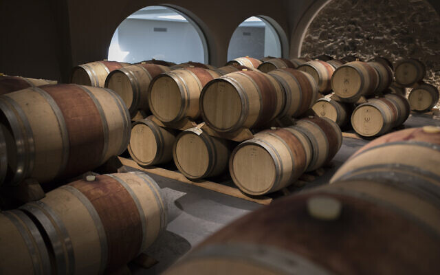 Wine barrels sit in a wine cellar in the southern France region of Provence, October 11, 2019. (AP Photo/Daniel Cole) Wine barrels sit in a wine cellar in the southern France region of Provence, October 11, 2019. (AP Photo/Daniel Cole)