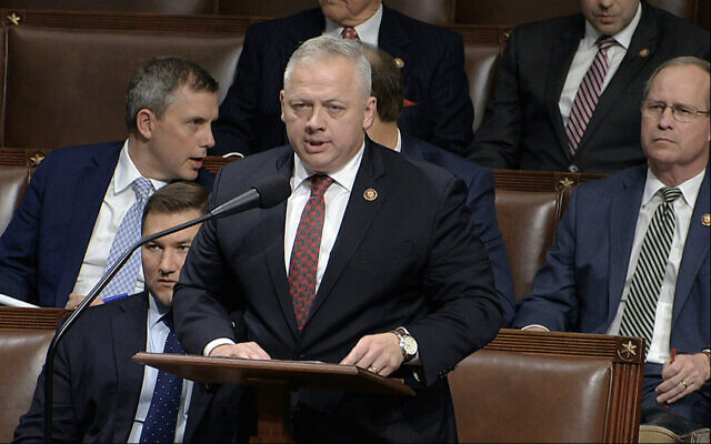 Rep. Denver Riggleman at a House of Representatives debate on the articles of impeachment against US President Donald Trump at the Capitol in Washington, December 18, 2019. (House Television via AP) Rep. Denver Riggleman at a House of Representatives debate on the articles of impeachment against US President Donald Trump at the Capitol in Washington, December 18, 2019. (House Television via AP)