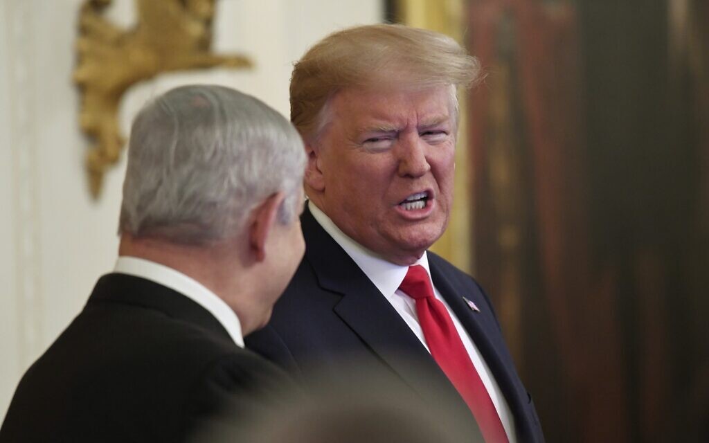 US President Donald Trump speaks during an event with Prime Minister Benjamin Netanyahu in the East Room of the White House in Washington, January 28, 2020. (AP Photo/Susan Walsh) US President Donald Trump speaks during an event with Prime Minister Benjamin Netanyahu in the East Room of the White House in Washington, January 28, 2020. (AP Photo/Susan Walsh)