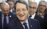 Cyprus' President Nicos Anastasiades, center, at the Ledra Palace Hotel inside the UN controlled buffer zone in divided capital Nicosia, Cyprus, Monday, Feb. 3, 2020. (AP/Petros Karadjias)