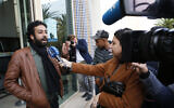 Journalist and activist Omar Radi speaks to the media after his hearing at the Casablanca Courthouse, In Casablanca, Morocco, March 5, 2020 (AP Photo/Abdeljalil Bounhar)
