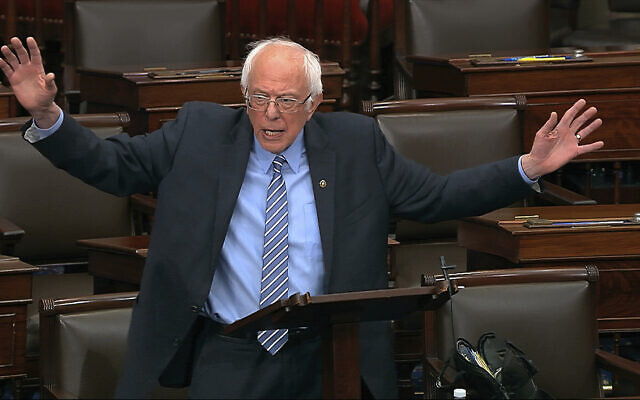 In this image from video, Sen. Bernie Sanders speaks on the Senate floor at the US Capitol in Washington, on March 25, 2020. (Senate Television via AP) In this image from video, Sen. Bernie Sanders speaks on the Senate floor at the US Capitol in Washington, on March 25, 2020. (Senate Television via AP)