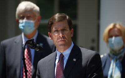 US Defense Secretary Mark Esper speaks during a press briefing about the coronavirus in the Rose Garden of the White House on May 15, 2020, in Washington. (AP Photo/Alex Brandon)