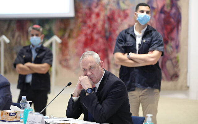 Defense Minister Benny Gantz attends the first cabinet meeting of the new government at the Chagall Hall in the Knesset in Jerusalem, May 24, 2020. (Abir Sultan/Pool Photo via AP) Defense Minister Benny Gantz attends the first cabinet meeting of the new government at the Chagall Hall in the Knesset in Jerusalem, May 24, 2020. (Abir Sultan/Pool Photo via AP)