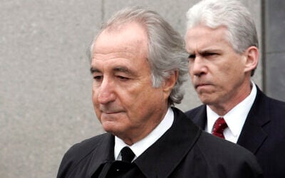 Bernie Madoff exits federal court in Manhattan on March 10, 2009. (AP Photo/David Karp, File)