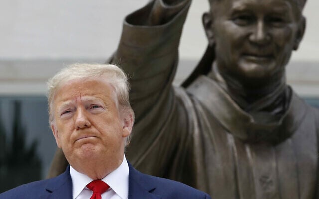President Donald Trump visits Saint John Paul II National Shrine with first lady Melania Trump on June 2, 2020, in Washington. (AP Photo/Patrick Semansky) President Donald Trump visits Saint John Paul II National Shrine with first lady Melania Trump on June 2, 2020, in Washington. (AP Photo/Patrick Semansky)