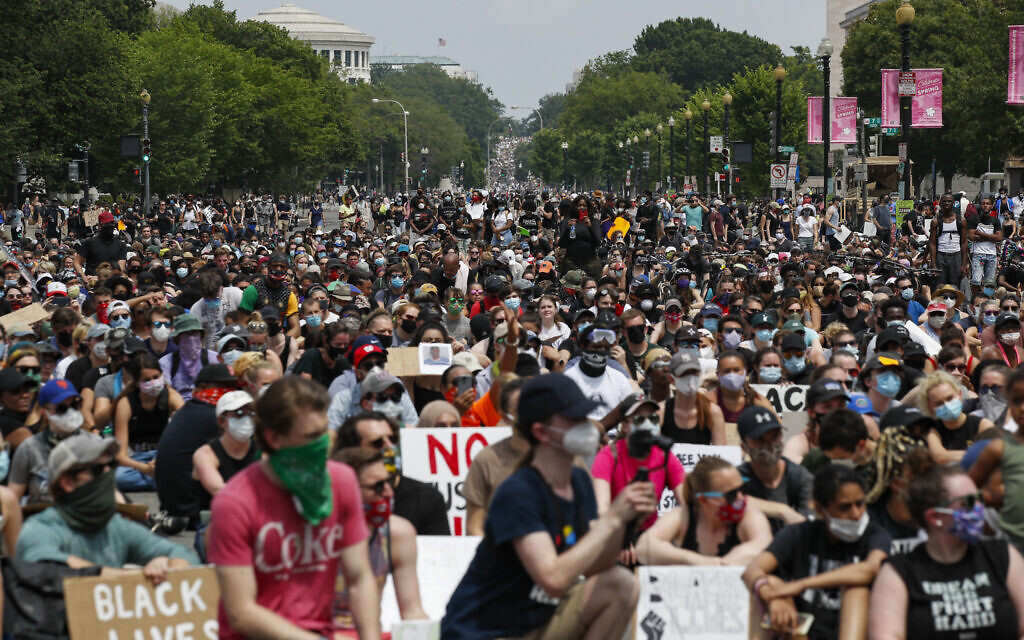 Demonstrators protest on June 6, 2020, in Washington, over the death of George Floyd, a black man who was in police custody in Minneapolis. Floyd died after being restrained by Minneapolis police officers. (AP/Alex Brandon)