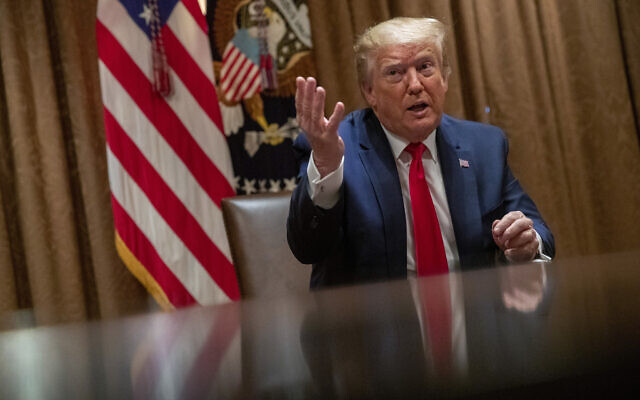 US President Donald Trump during a roundtable discussion with African-American supporters in the Cabinet Room of the White House, June 10, 2020, in Washington. (AP Photo/Patrick Semansky) US President Donald Trump during a roundtable discussion with African-American supporters in the Cabinet Room of the White House, June 10, 2020, in Washington. (AP Photo/Patrick Semansky)