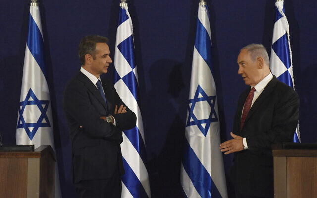 Prime Minister Benjamin Netanyahu, right, and Greek Prime Minister Kyriakos Mitsotakis give joint statements in Jerusalem, June 16, 2020. (Debbie Hill, UPI Pool via AP) Prime Minister Benjamin Netanyahu, right, and Greek Prime Minister Kyriakos Mitsotakis give joint statements in Jerusalem, June 16, 2020. (Debbie Hill, UPI Pool via AP)
