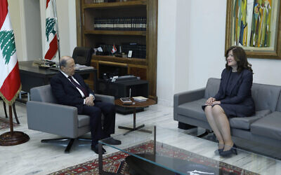 In this photo released on Thursday, June 11, 2020 by the Lebanese Government, President Michel Aoun, left, meets with U.S. Ambassador to Lebanon Dorothy Shea, at the Presidential Palace in Baabda, east of Beirut, Lebanon. (Dalati Nohra/Lebanese Government via AP)