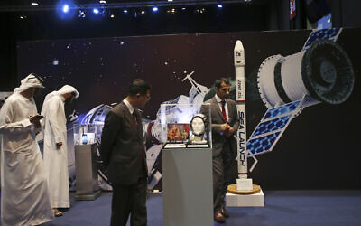 Emirati and other visitors visit the Space Museum during the launch of the UAE Space Agency strategic plan in Abu Dhabi, United Arab Emirates, May 25, 2015 (AP Photo/Kamran Jebreili)