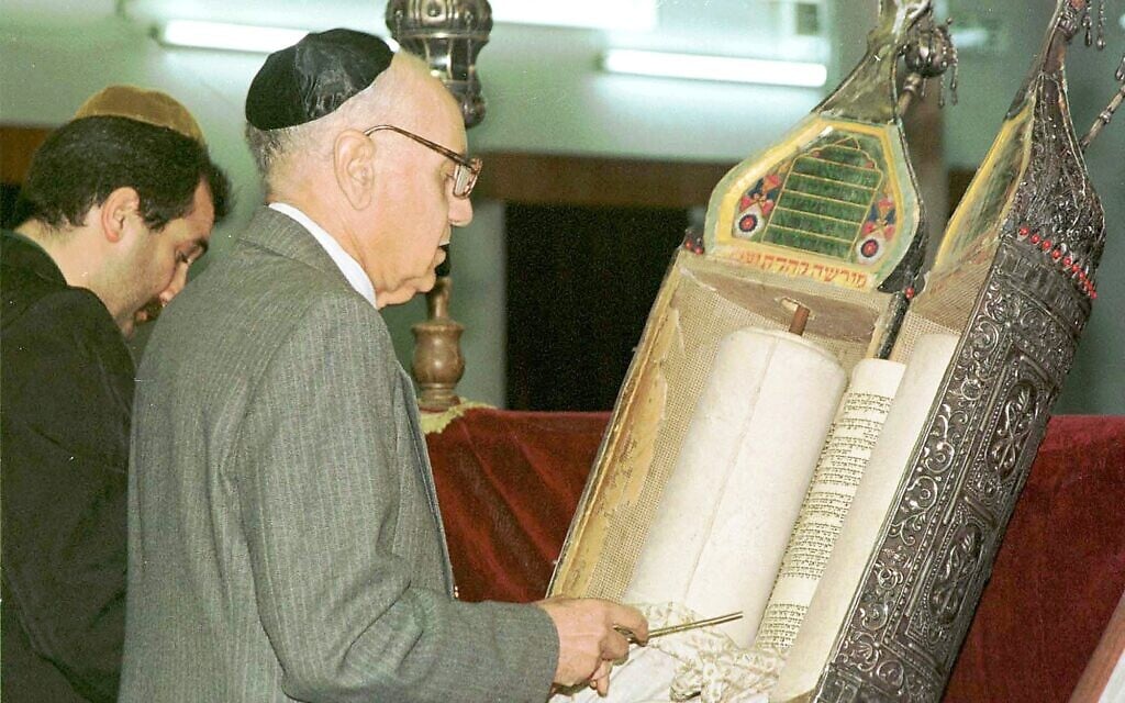 In this 1998 file photo, Tawfiq Safeer prepares for prayer in the synagogue of Baghdad, Saturday, March 21, 1998. (AP Photo/Jassim Mohammed)