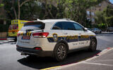 FILE -- A police car parked in Petah Tikva, August 4, 2017 (Roy Alima/Flash90)