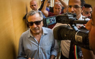 Actor Moshe Ivgy arrives at the Haifa Magistrate's Court for the opening of his trial, June 18, 2018 (Meir Vaknin/Flash90)