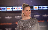 Model and host of the 2019 Eurovision Song Contest, Bar Refaeli, poses on the Orange Carpet, during the opening event, at Habima Square in Tel Aviv on May 12, 2019 (Hadas Parush/Flash90)