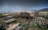 A bunch of wooden pallets in the Jordan Valley on February 2, 2020. (Yaniv Nadav/FLASH90)
