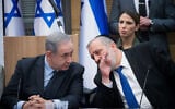 Prime Minister Benjamin Netanyahu, left, with Shas party chairman Interior Minister Aryeh Deri, March 4, 2020. (Yonatan Sindel/Flash90)