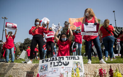 Self-employed people and kindergarten owners participate in a rally calling for financial support from the Israeli government in Jerusalem, on April 19, 2020 (Yonatan Sindel/Flash90)