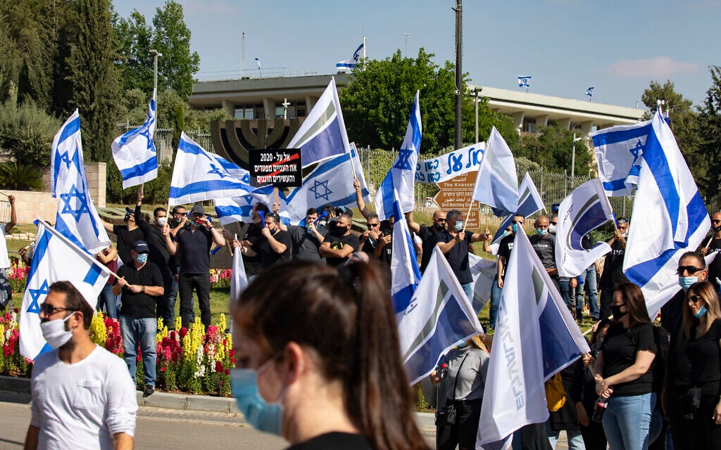 El Al workers protest the airline's intention to lay off some employees due to the coronavirus economic crisis, on May 10, 2020, outside the Finance Ministry in Jerusalem (Olivier Fitoussi/Flash90) El Al workers protest the airline's intention to lay off some employees due to the coronavirus economic crisis, on May 10, 2020, outside the Finance Ministry in Jerusalem (Olivier Fitoussi/Flash90)