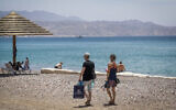 People at the Red Sea in the southern city of Eilat on May 13, 2020. (Yossi Zeliger/Flash90)
