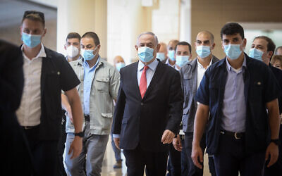 Prime Minister Benjamin Netanyahu arrives to a Likud party meeting at the Knesset, Israel's parliament in Jerusalem on May 25, 2020. (Flash90)