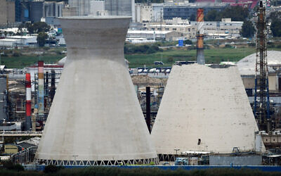 View of the former  cooling towers at the Bazan Group oil refinery complex on June 12, 2020, hours after one of them collapsed. (Meir Vaknin/Flash90)
