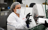 A Sion Medical workers makes protective masks at the company's factory in the southern city of Sderot on June 17, 2020. (Yossi Zeliger/Flash90)