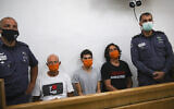 Brig. Gen. (Res.) Amir Haskel (C) and two other protesters at Jerusalem Magistrate's Court Hearing onJune 27, 2020, after they were arrested during a protest outside Prime Minister Benjamin Netanyahu's official Jerusalem residence. (Yonatan Sindel/Flash90)