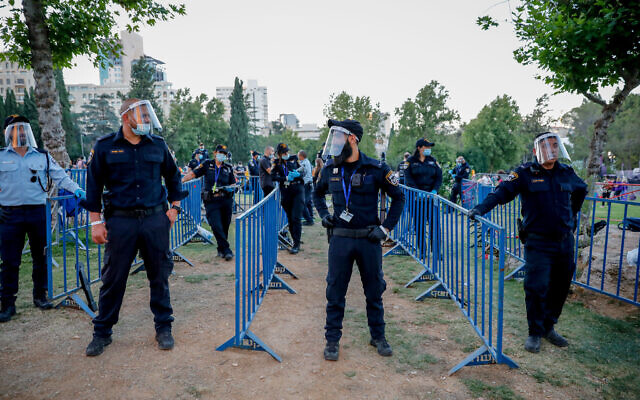 Police stand guard at the entrance to the LGBT rights protest rally in Jerusalem on June 28, 2020. (Olivier Fitoussi/Flash90)