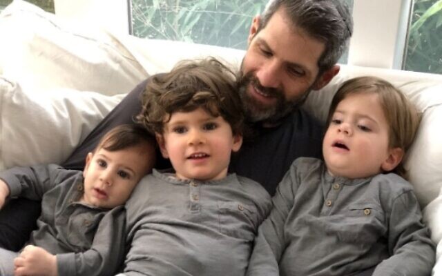 Father Gary Landsman with kids Father Gary Landsman with kids