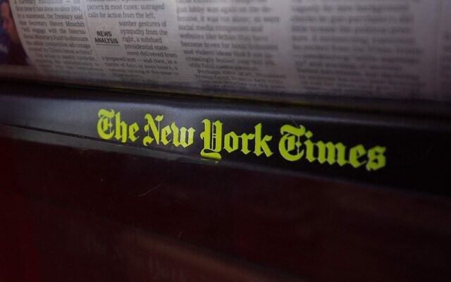 The New York Times logo is seen on a newspaper rack at a convenience store in Washington, DC, on August 6, 2019. (ALASTAIR PIKE/AFP via Getty Images and JTA) The New York Times logo is seen on a newspaper rack at a convenience store in Washington, DC, on August 6, 2019. (ALASTAIR PIKE/AFP via Getty Images and JTA)