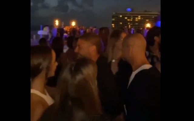 A party at the Carlton Hotel in Tel Aviv on June 2, 2020. (Screen capture: Twitter) A party at the Carlton Hotel in Tel Aviv on June 2, 2020. (Screen capture: Twitter)